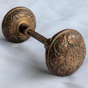 Pair of Antique 1890's Victorian Eastlake Cast Brass Door Knobs on Spindle with Set Screws