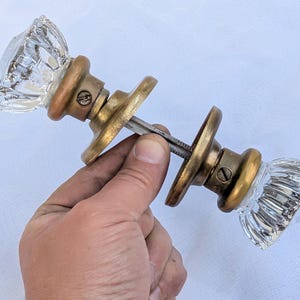 Vintage Pair of 12-Point Faceted Clear Crystal Glass & Brass Door Knobs on Spindle with Set Screws and Rosettes - Set #16