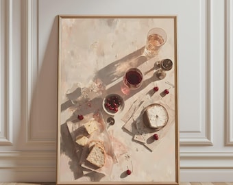 May include: A framed art print featuring a still life painting of a light-toned table setting. The composition includes a glass of red wine, a glass of water, a small bowl of red cherries, a round cheese wheel, and slices of bread on paper.