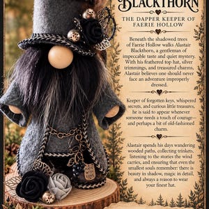 May include: A grey felt gnome figurine wearing a top hat adorned with a feather, black roses, and silver accents. The gnome has a wooden nose, a long black beard, and a metal chain with a tag reading Made With Love. Text includes Alastair Blackthorn.
