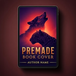 May include: A digital tablet displaying a book cover design featuring a howling wolf and a leopard silhouette against a vibrant red and purple sunset background. The text reads PREMADE BOOK COVER and AUTHOR NAME in gold, serif, capitalized lettering.