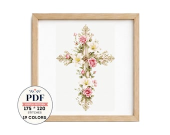 May include: A cross-stitch pattern featuring a decorative cross adorned with pink roses and white lilies. The design is presented in a light wood frame. A circular badge indicates it is a PDF digital pattern with 175 by 120 stitches and 19 colors.