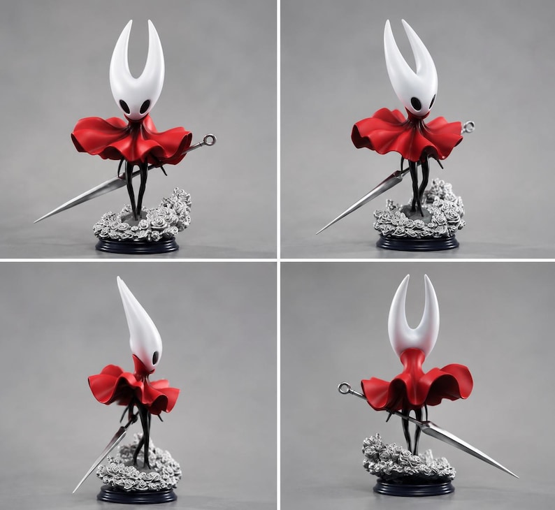 May include: A collectible figurine of a character with a white, horned head and black eyes, wearing a vibrant red cloak. The figure holds a long, silver-colored needle-like weapon and stands on a base decorated with sculpted gray roses.