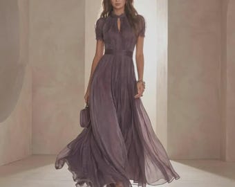 May include: A floor-length mauve dress featuring short sleeves, a high neckline with a small cutout, and a fitted waist. The skirt is made of a sheer, flowing fabric that drapes to the floor, creating a soft, layered appearance in this garment.