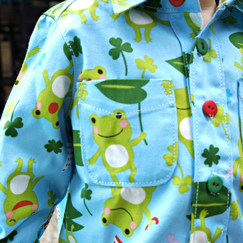 Cool shirt, pdf sewing pattern by Frocks & Frolics. Boys button down shirt for boys age 1-14. Here in a cute cotton frock print. It has cuffs, a stand up collar and classic yoke.