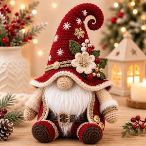 May include: A crocheted gnome figurine wearing a tall, curled red hat decorated with white snowflake embroidery, a gold snowflake charm, and a cluster of fabric flowers, green leaves, and red berries. It has a white beard and a brown belt.