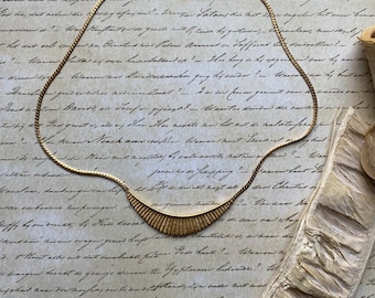 Avon  Gold Tone Pleated Crescent Necklace - Vintage 1984