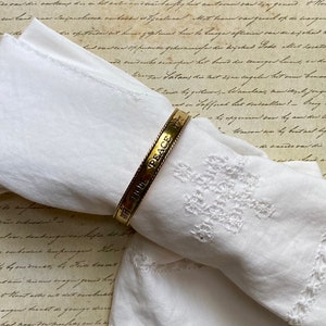 Avon Let There Be Peace Gold Tone bangle bracelet - vintage 1992