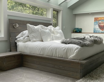 Platform bed base, nightstands and elongated angled solid wood headboard with lighting