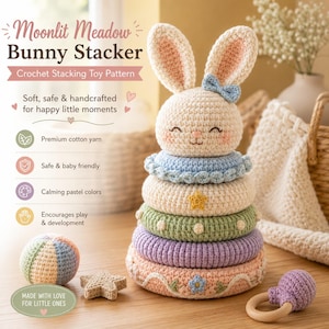 May include: A crochet stacking toy pattern titled Moonlit Meadow Bunny Stacker. The toy features a cream-colored bunny head topper with long ears and a blue bow, stacked on rings in blue, cream with a yellow star, green with white dots, purple, and peach with floral details.