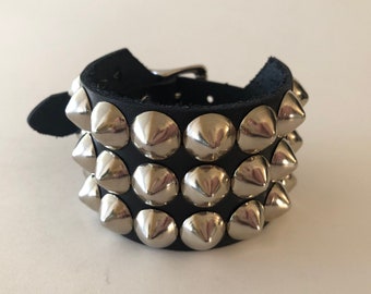 Punk bracelet with 3 rows of cone studs