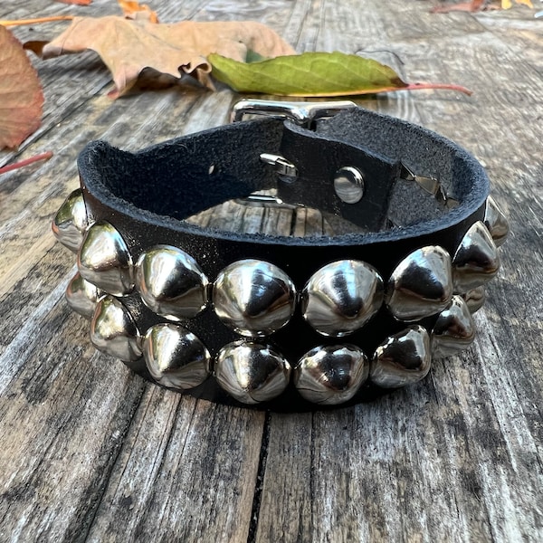 Studded punk bracelet with two rows of tiny cone studs