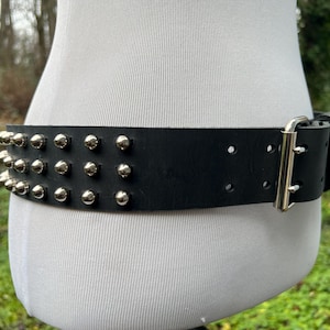 2” wide studded belt with 3 rows of bullet studs