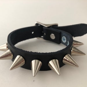 Gothic punk spike bracelet with 1/2” cones