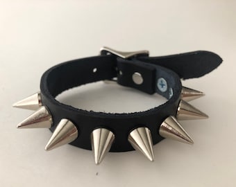 Gothic punk spike bracelet with 1/2” cones