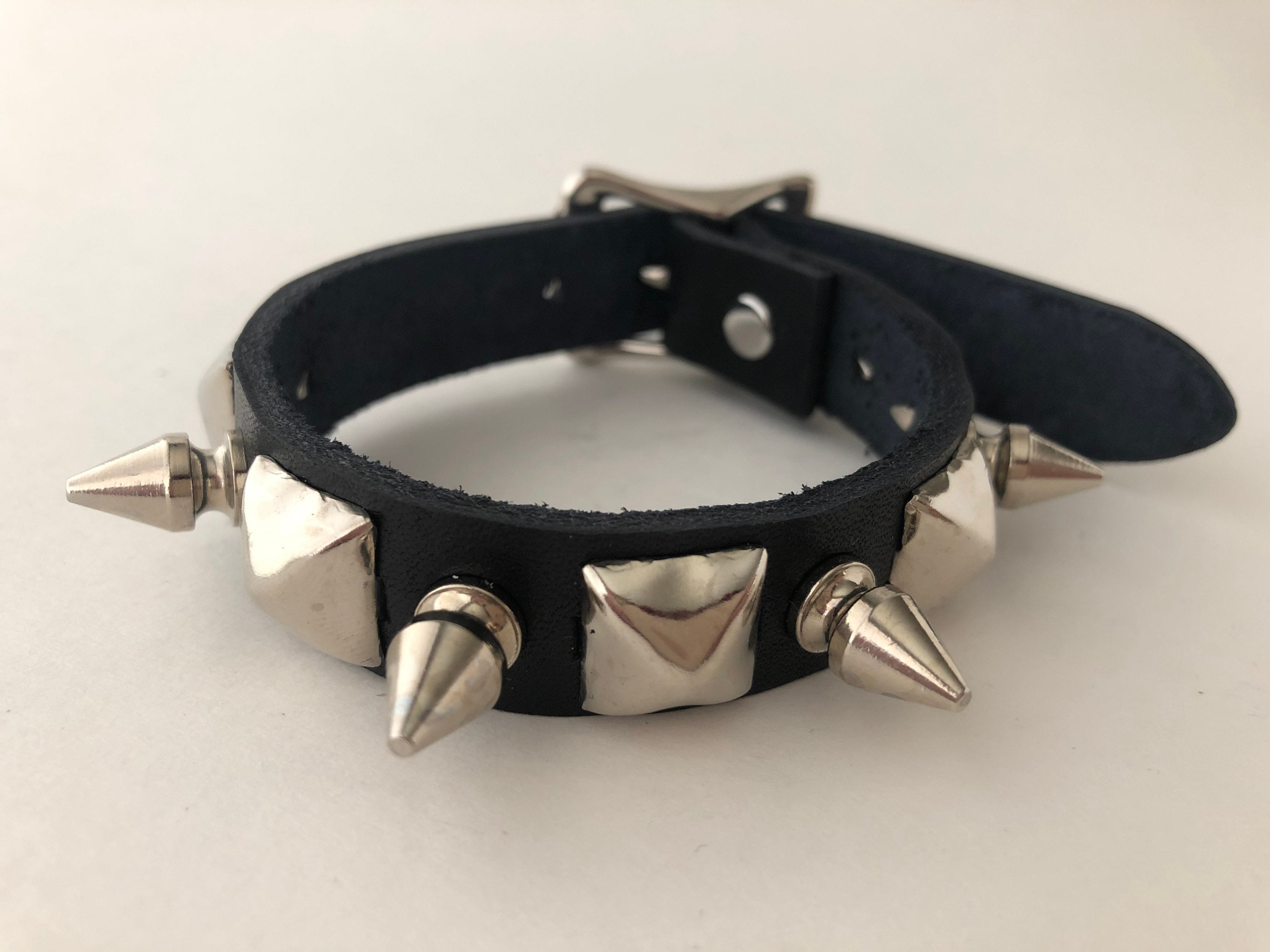 Crust punk spiked bracelet with little tree spikes and pyramid studs