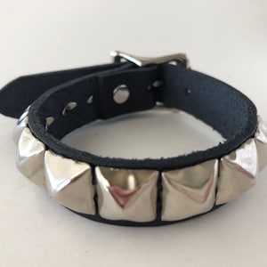 Punk bracelet with one row of 1/2&quot; pyramid studs