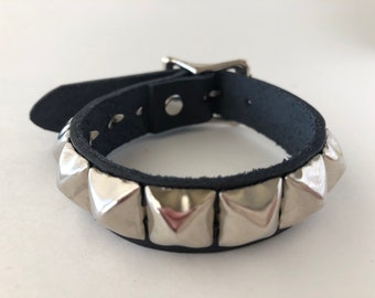 Punk bracelet with one row of 1/2&quot; pyramid studs