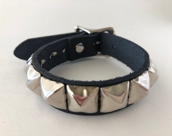 Punk bracelet with one row of 1/2" pyramid studs