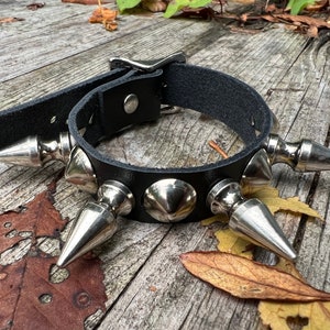 Punk spiked bracelet with cone studs and 1&quot; spikes