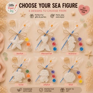 May include: Six clear plastic bags containing sea-themed plaster figures, a blue paintbrush, and three paint pots. The figures include a starfish, mermaid tail, seahorse, turtle, jellyfish, and shell. Each bag has a brown tag labeled Handmade with love.