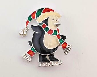 Vintage Avon Skating Penguin Enameled Holiday Brooch – Striped Scarf & Santa Hat