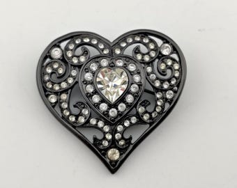 Vintage Monet Black Tone Openwork Heart Brooch with Clear Rhinestones and Faceted Crystal Center