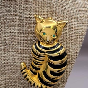 Black Enameled Golden Cat Pin - Vintage Gold Tone Kitty Brooch with Black Enameled Stripes and Sparkling Green Rhinestones for Eyes K#2354
