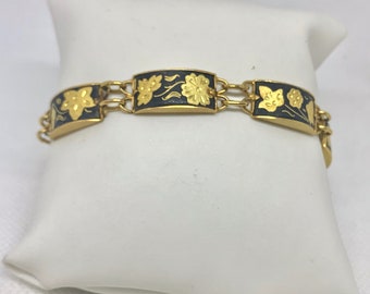 Vintage damascene bracelet dainty damascene gold bracelet spring closure black and gold toldeoware bracelet