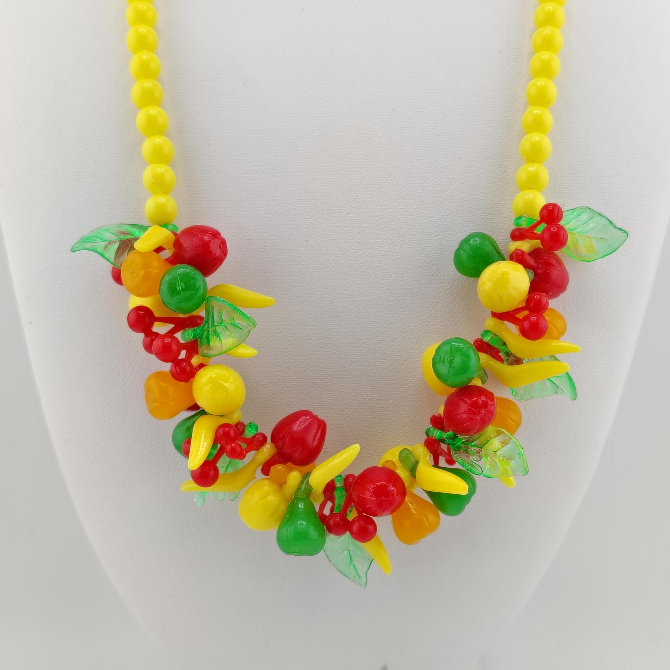1950s Vibrant Dangling Molded Plastic Fruit Frontal Bead