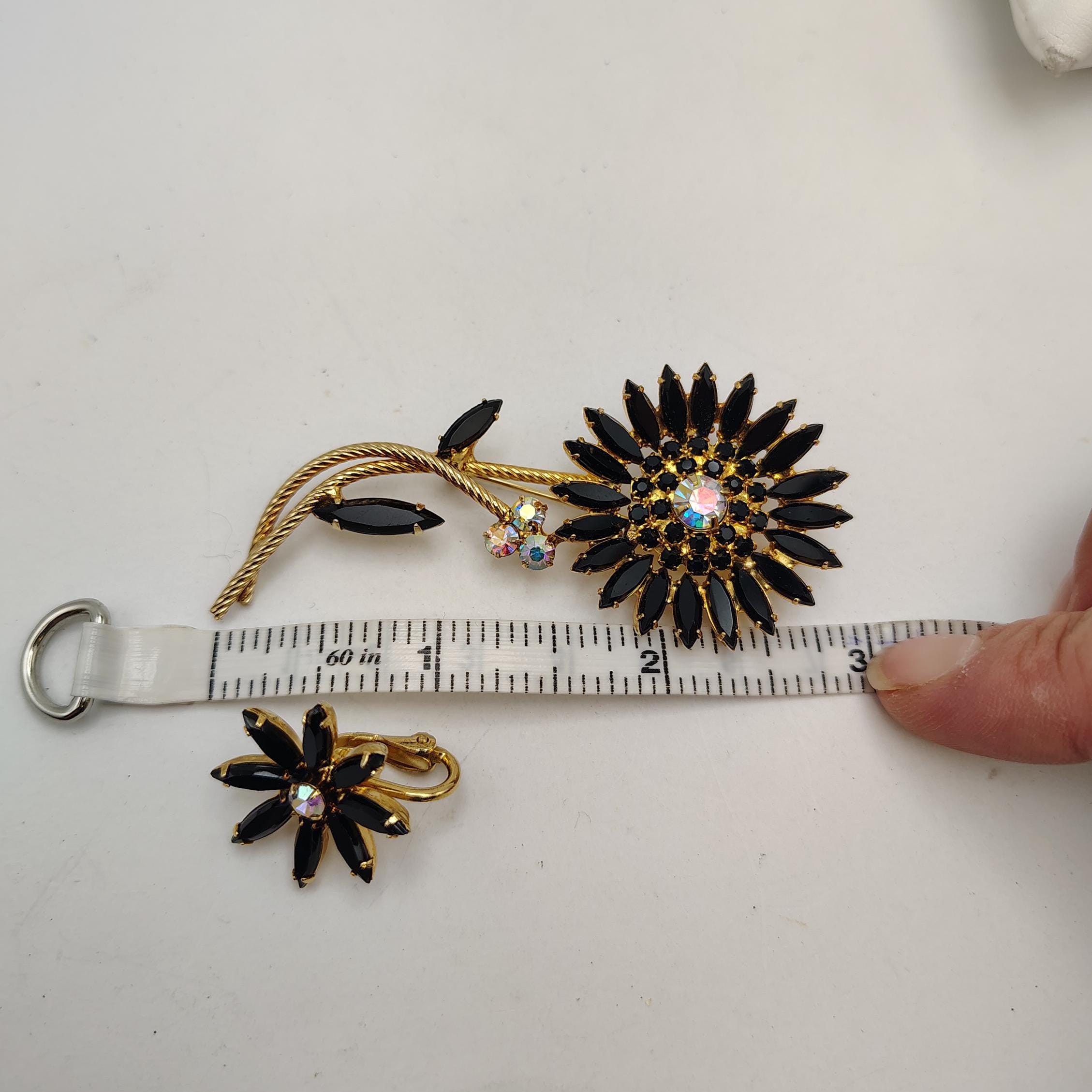 Napier Designer Black Prong Set Rhinestone Floral Brooch