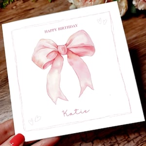 rosa alles Gute zum Geburtstag mit Schleife. Personalisierte Geburtstagskarte mit rosa Schleife für alle Damen in deinem Leben