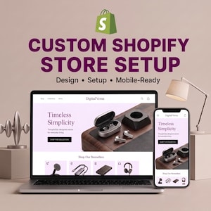May include: A laptop and a smartphone displaying a website titled Digital Versa with the text Custom Shopify Store Setup, Design, Setup, Mobile-Ready. The website features a product page for wireless earbuds on a wooden surface with a lamp.