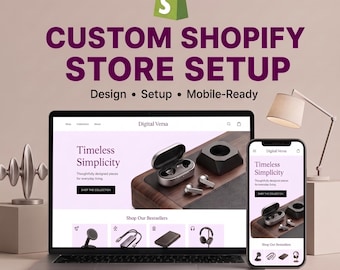 May include: A laptop and a smartphone displaying a website titled Digital Versa with the text Custom Shopify Store Setup, Design, Setup, Mobile-Ready. The website features a product page for wireless earbuds on a wooden surface with a lamp.