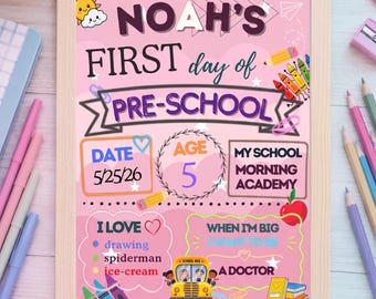 May include: A framed pink sign titled Noah's First Day of Pre-School. It features sections for date 5/25/26, age 5, school name Morning Academy, interests including drawing, Spiderman, and ice-cream, and a career goal of becoming a doctor, with school bus graphics.