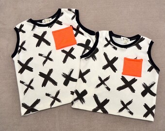 Infant or Toddler Exes Organic cotton Tank-Racerback style with ribbed trim and neon pocket