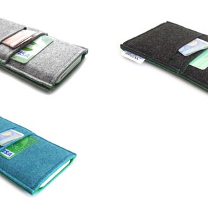 May include: Three felt phone cases with green stitching. The cases are gray, black, and teal. Each case has a card slot and a clear plastic window for displaying ID.