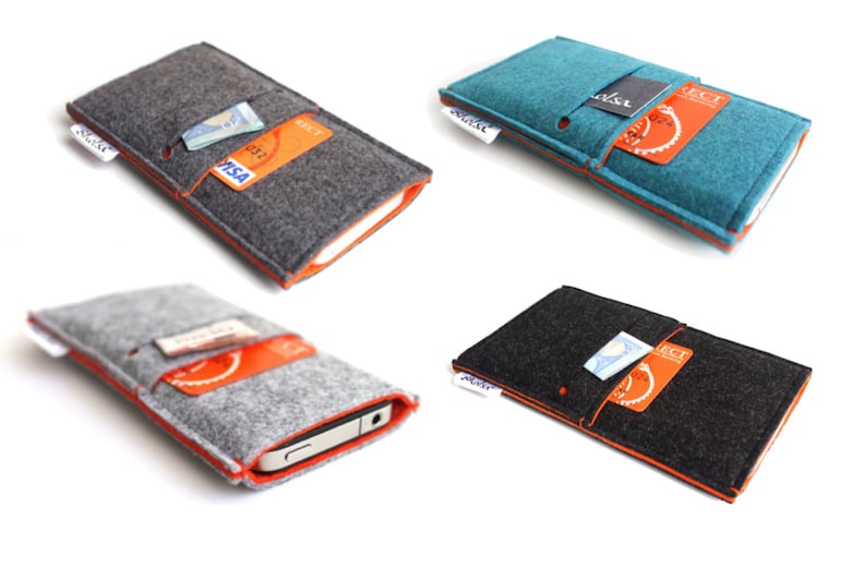 May include: Four felt phone cases with orange stitching. Each case has a slot for a credit card and a pocket for cash. The cases are in gray, teal, black, and gray.
