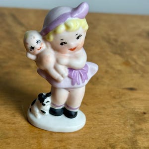 Vintage Kewpie Figurine, Porcelain Girl with Dog and Doll Figurine – Kewpie Doll Collectible – Kitsch Figurine - Vintage Penny Doll