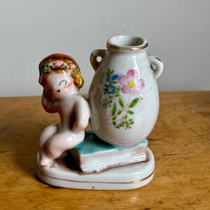 Vintage Mocco Porcelain Bathing Beauty Figurine – Woman Sitting on Book with Urn Vase – Hand-Painted Collectible from Occupied Japan