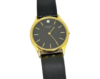 Vintage Caravelle by Bulova Women's Watch: Diamond Dial, Black Leather Band