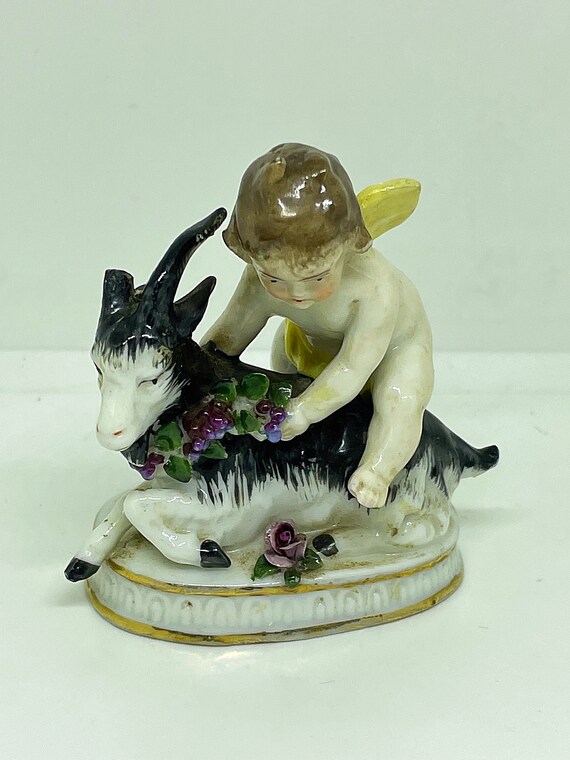 porcelain goat figurines
