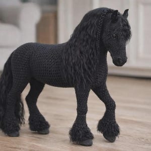 May include: A handcrafted black crochet horse figurine featuring a long, flowing mane with a braided section, a full tail, and textured leg feathering. The horse is depicted in a standing position with one front leg slightly raised, showcasing detailed stitching.