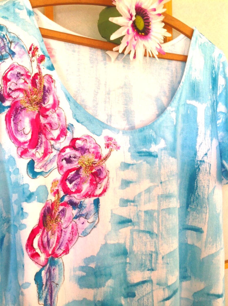 draped hibiscus on aqua