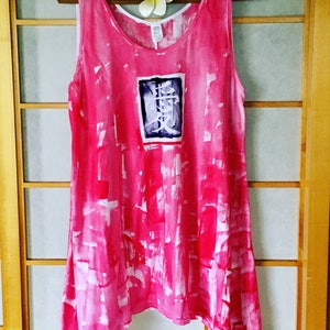 Red tunic with love stamp