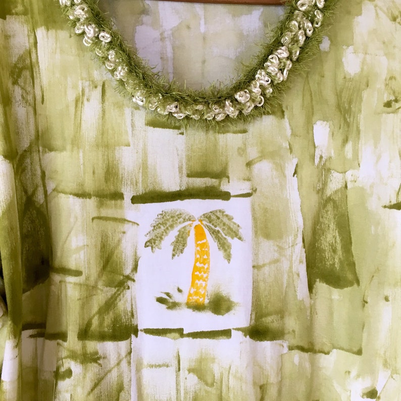 Avocado with palm tree (lei not included)