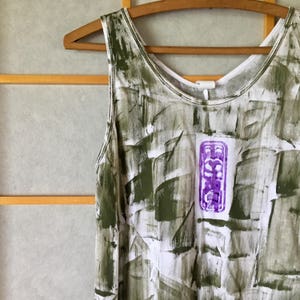 Olive with purple tiki