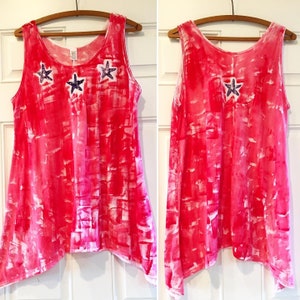 red tunic with star  fish lei