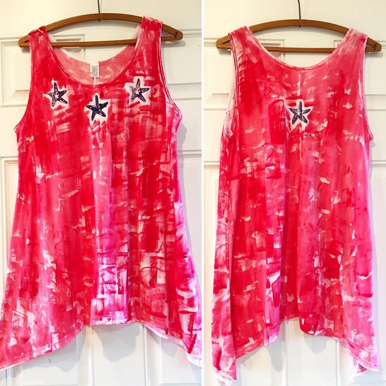 red tunic with star  fish lei