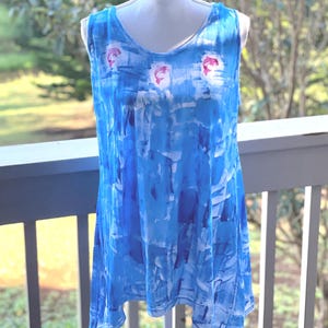 blue tunic with dolphins